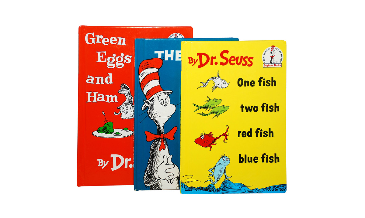 Three Dr. Seuss books on a white background